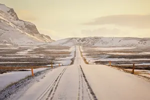 West Iceland Prints: View of the road near Snaefellsjokull volcano at sunrise in winter