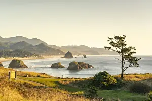 Cannon Beach Prints: View of rock formations and Haystack Rock of Cannon Beach from Ecola State Park