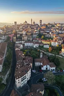 Historical Center Prints: View of the rooftops, churches and towers of the Upper Town (Citt√† Alta) of Bergamo city at sunrise