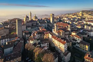 Historical Center Prints: View of the rooftops, churches and towers of the Upper Town (Citt√† Alta) of Bergamo city at sunrise
