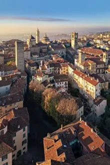 Historical Center Prints: View of the rooftops, churches and towers of the Upper Town (Citt√† Alta) of Bergamo city at sunrise