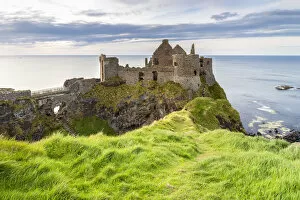 One Man Collection: View of the ruins of the Dunluce Castle. Bushmills, County Antrim, Ulster region