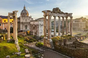 Columns Gallery: View of the ruins of Fori Imperiali from the Campidoglio at dawn
