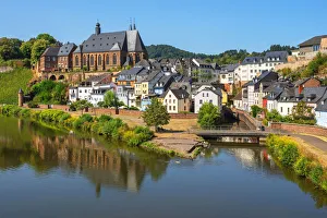 View at Saarburg with church St. Laurentius, river Saar and river Leuk