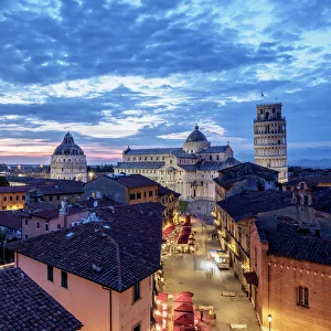 View over Via Santa Maria towards Cathedral and Leaning Tower at dusk, Pisa, Tuscany