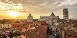 Towers Collection: View over Via Santa Maria towards Cathedral and Leaning Tower at sunset, Pisa, Tuscany