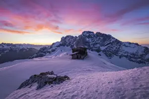 Foothills Prints: View of the snow-covered north face of the Presolana mountain in winter at sunrise with