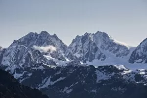 View of the snowy peak Bernina and peak Roseg at summer Malenco Valley Valtellina