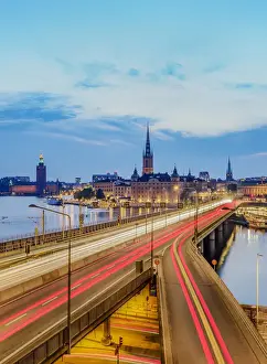 Baltic Prints: View over Sodra Jarnvagsbron Bridge towards the Riddarholmen Church and City Hall at dusk