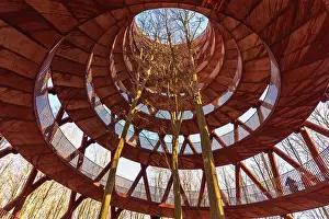 Outdoor Activity Prints: Detail view from below of the spiral path climbing the architectural structure of the forest tower among trees