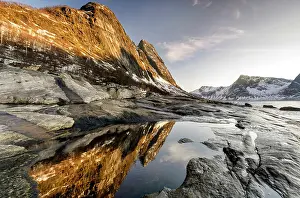 Tungeneset Prints: View towards Steinfjord and snow-covered mountains at sunset in winter