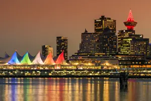 West Coast Prints: View at sunset of Canada Place and Harbour Centre building decorated with Christmas lights