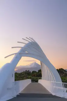 Volcanic Cone Prints: View of the Taranaki volcano in New Zealand through a modern bridge in New Plymouth
