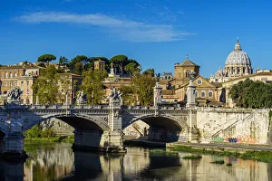 View of Tiber river with St. Peters Basilica in the background, Rome, Italy View of Tiber river with St. Peters Basilica in the background, Rome, Italy