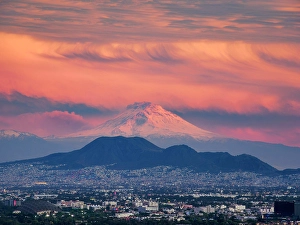 Popocatepetl Prints: View towards the Volcano Popocatepetl at sunset, Mexico City, Mexico