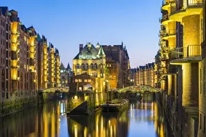 Speicherstadt Prints: View of Wasserschlosz at night from Poggenmuhlenbrucke in Speicherstadt warehouse district