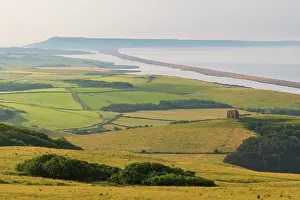 Scenry Prints: View over West Dorset's rolling countryside to St Catherine's Chapel and Chesil Beach