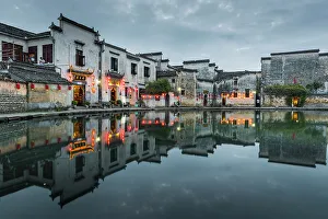 Village buildings reflected in pond, Hongcun, China