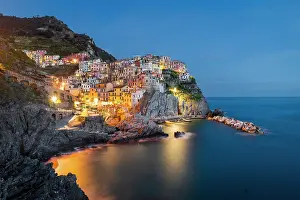 Cinque Terre Prints: The village of Manarola at dusk, Cinque Terre, La Spezia district, Liguria, Italy