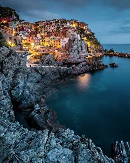 Manarola Prints: The village of Manarola at dusk, Cinque Terre, La Spezia district, Liguria, Italy