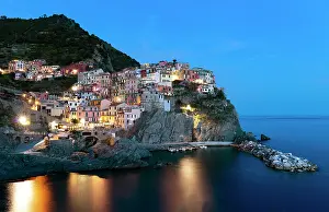 Manarola Prints: The village of Manarola at sunset, Cinque Terre, La Spezia district, Liguria, Italy