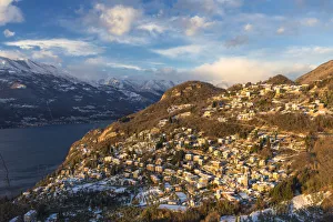 Province Of Lecco Prints: Village of Perledo illuminates by the sun after a snowfall. Como Lake, Lombardy, Italy