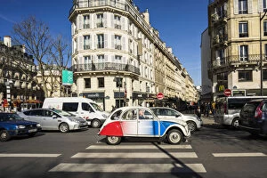Images Dated 3rd September 2015: A vintage Citroen car painted in the colours of the France flag gets stuck in the