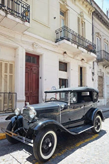 Images Dated 27th April 2023: A vintage Ford Model A car in front of a colonial house in San Telmo, Buenos Aires, Argentina