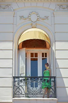 Images Dated 27th April 2023: A vintage mannequin at the window of a colonial style house in San Telmo, Buenos Aires, Argentina