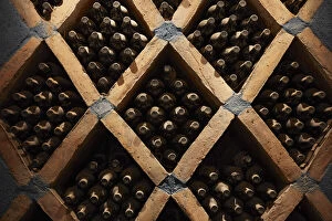 Aged Gallery: Vintage wine bottles in the cave of the Bodega 'Las Arcas de Tolombon' winery, Colalao del Valle