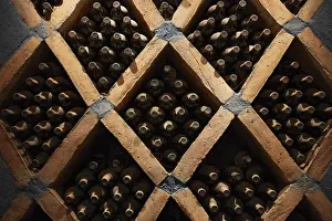 Bodega Prints: Vintage wine bottles in the cave of the Bodega Las Arcas de Tolombon winery