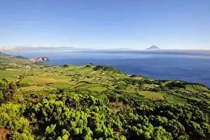 Horizons Prints: Volcanic craters along the Sao Jorge island and the Pico volcano on the horizon