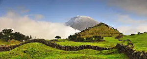 Solitude Gallery: The volcano covered with snow, 2351 meters high, at the Pico island