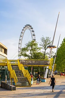Walking along the South Bank, London Eye, London, England, UK