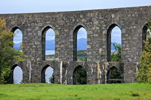 Argyll Prints: The Walls of McCaig's Tower on Battery Hill overlooking Oban with the Scoittish Highlands beyond