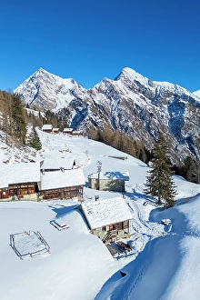Piedmont Prints: walser huts in Alpe Otro in winter. Alagna, Valsesia, Vercelli province, Piedmont, Italy