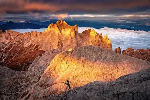 Torri Del Vajolet Prints: Warm autumn sunrise over the majestic peaks of Catinaccio (Rosengarten) and Torri Del Vajolet