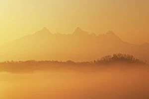 Images Dated 1st June 2023: the warm light envelope the Apuan Alps during a winter sunrise, Tuscany, Italy