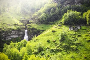 Creek Prints: Waterfall of Ri da Sernel and typical houses in spring, Brontallo, Val Lavizzara