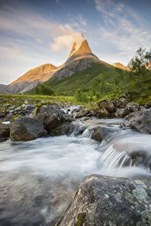 Fiord Prints: Waterfall in front of Stetinden mountain peak during midnight sun, Tysfjord, Norway