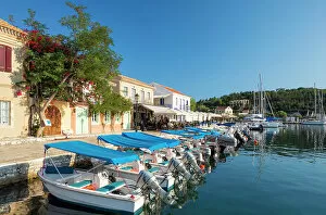 Images Dated 17th August 2022: Waterfront cafes at Fiskardo Harbour, Kefalonia, Ionian Islands, Greece