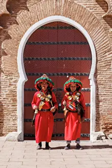 Marrakech Prints: Watersellers in front of iconic door, Marrakech, Morocco
