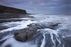 Images Dated 22nd January 2015: Waves rushing around broken ledges at Nash Point on the Glamorgan Heritage Coast, Wales