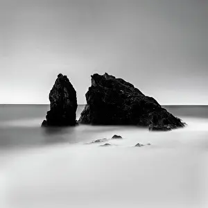 Cinque Terre Prints: Waves washing around lsrge rocks off the beach at Monterosso al Mare