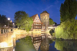 Traditional Building Prints: Weinstadel and Maxbrucke along River Pegnitz at dusk, Nuremberg, Bavaria, Germany