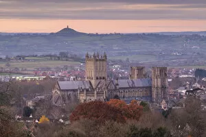 Images Dated 19th November 2020: Wells Cathedral and Glastonbury Tor at dawn, Somerset, England. Winter (December) 2019
