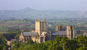Wells Cathedral and Glastonbury Tor on a misty Spring morning, Wells, Somerset, England