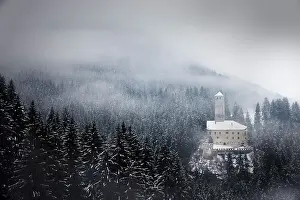 Welsberg Castle(Monguelfo castle) in the morning fog after a snowfall. Monguelfo, Val di Casies, Bolzano province, South Tyrol, Italy Europe