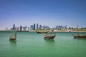Images Dated 5th April 2019: West Bay skyline and Dhows in harbour, Doha, Qatar