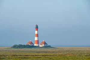 Salt Marsh Prints: Westerhever Lighthouse at sunrise, built in 1906, Westerhever, Nordfriesland